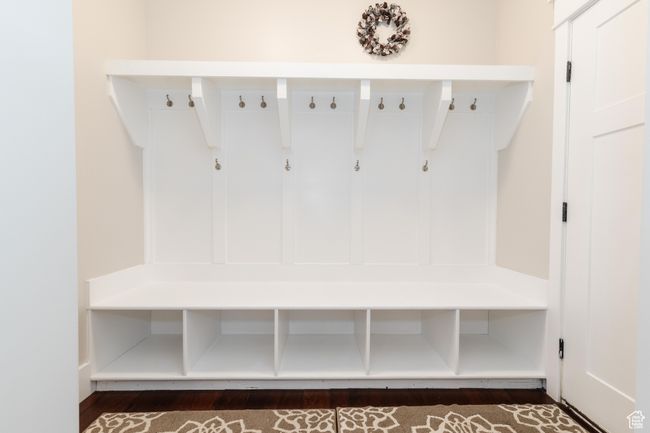 Mudroom featuring dark wood finished floors | Image 16