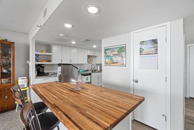 Beautiful island. Door is to pantry | Image 7