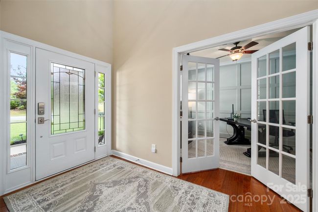 Inviting foyer offers direct access to home office and Dining Room | Image 5
