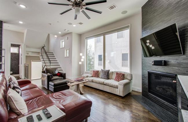 Modern fixures, large windows and a 1/2 bath are just a few great features of this stunning Midtown home. | Image 8