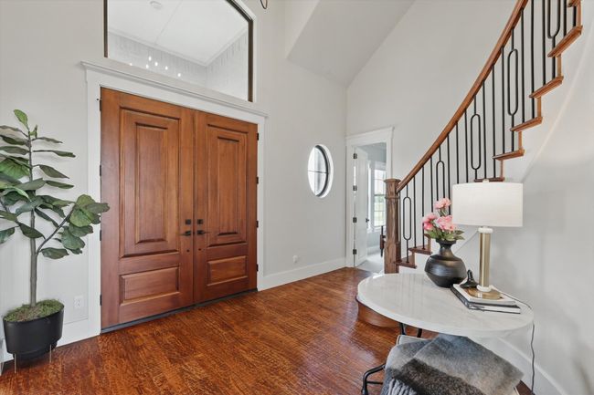 Two story entry with beautiful wood floors | Image 6