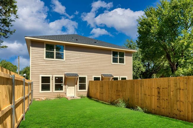 Back of property with a lawn | Image 18
