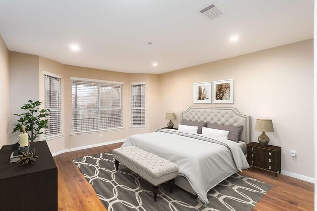 Bedroom with , recessed lighting, baseboards, and wood finished floors. ( Virtually staged) | Image 4