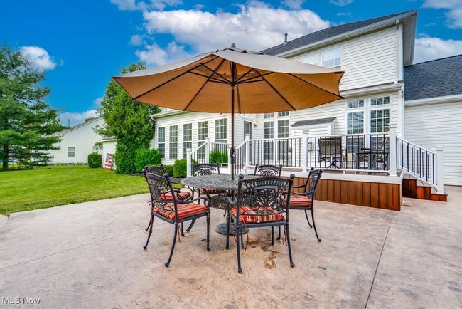 View of patio featuring outdoor dining space | Image 44