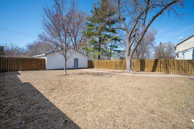 Oversized 2.5 car garage with additonal parking on the side. | Image 23