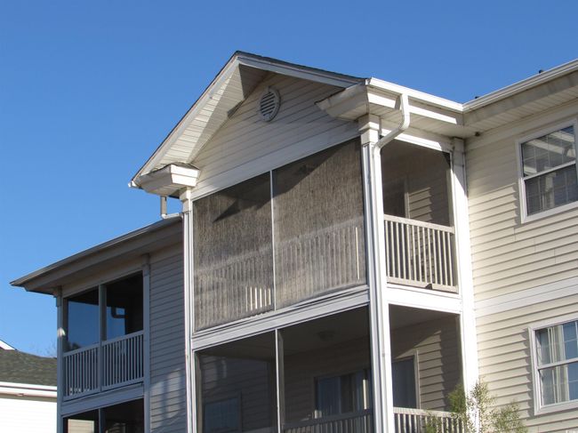 View of rear of the building and your screen porch. | Image 10