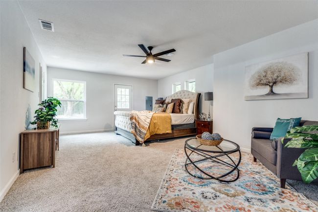 Bedroom with carpet flooring and ceiling fan | Image 16