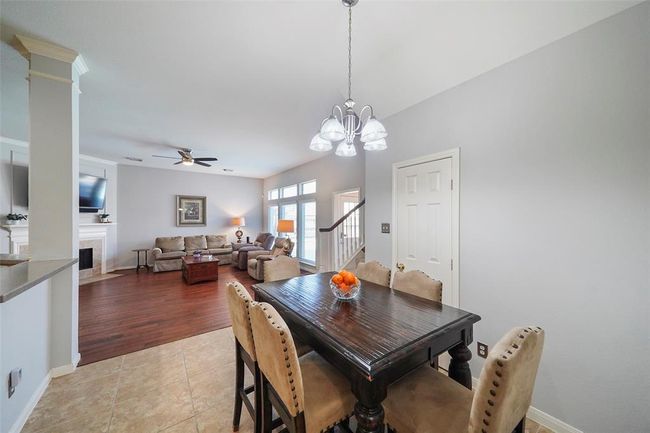 Another view of the large breakfast area open to the family room. | Image 11