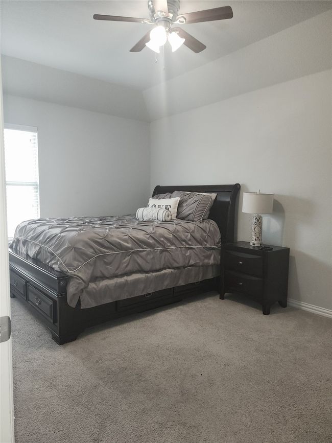 Bedroom featuring carpet floors and a ceiling fan | Image 22