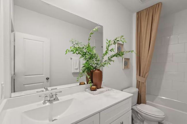 Photo of Pulte model home with same floor plan, not of actual home listed. | Image 10
