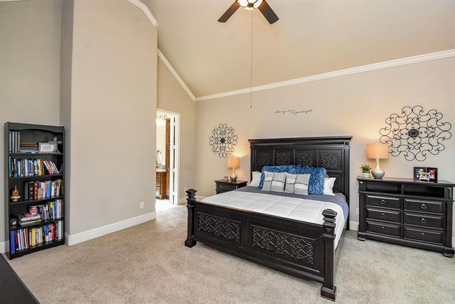 Double doors lead into the ensuite bath. | Image 25