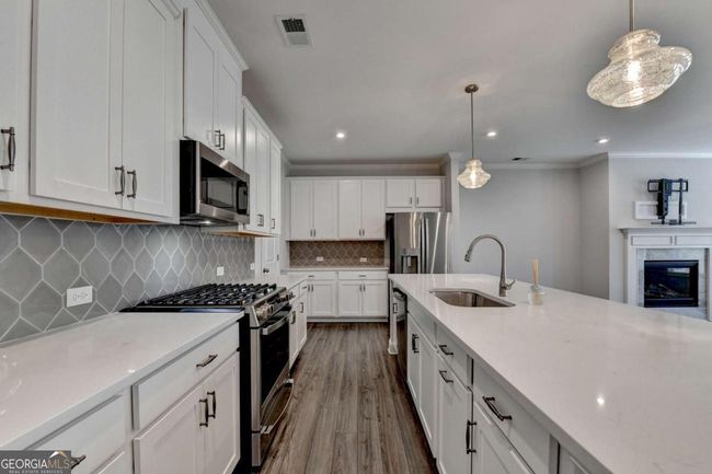 6270 Bracken Brown Dr, Townhouse with 3 bedrooms, 3 bathrooms and 2 parking in Alpharetta GA | Image 9