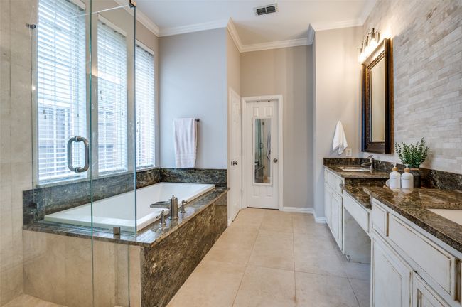 Ensuite Primary Bath featuring gorgeous granite, jetted spa tub, seemless glass shower and double vnity! | Image 29