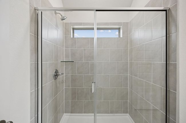Bathroom featuring a stall shower | Image 25