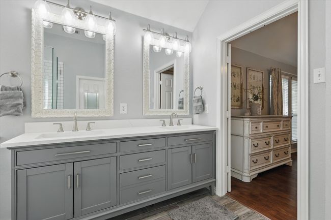 Bathroom featuring wood finished floors and double vanity | Image 19