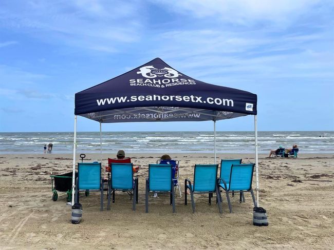 Branded, comfortable, and ready when you are. Whether you’re a homeowner or a short-term rental guest, Seahorse Estates makes it easy to relax under custom-branded tents and watch the waves roll in. This is what vacation-mode looks like—without lifting a finger. | Image 16