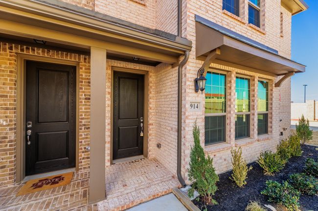 Doorway to property with brick siding | Image 4