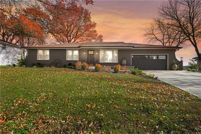 View of front of property with a lawn and a 2 car garage | Image 1