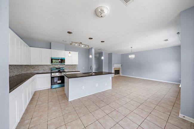 Homeowner did not remove the protective coverings from new appliances. They are stainless steel appliances. | Image 12