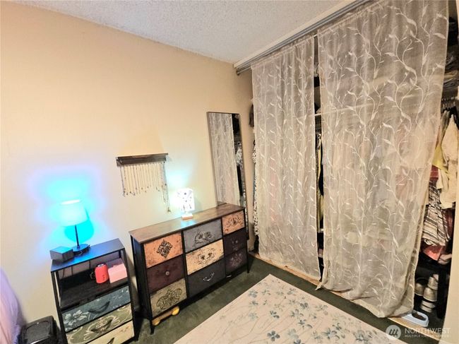 has a spacious closet. | Image 24