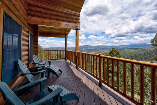 Wooden deck with a mountain view | Image 36