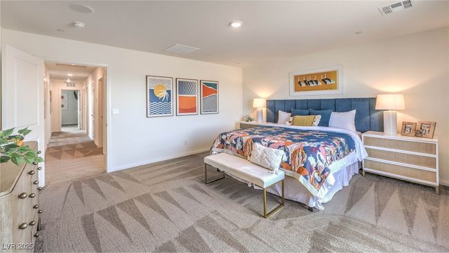 Photo is representational only; actual home finishes may vary. Carpeted bedroom featuring baseboards | Image 8