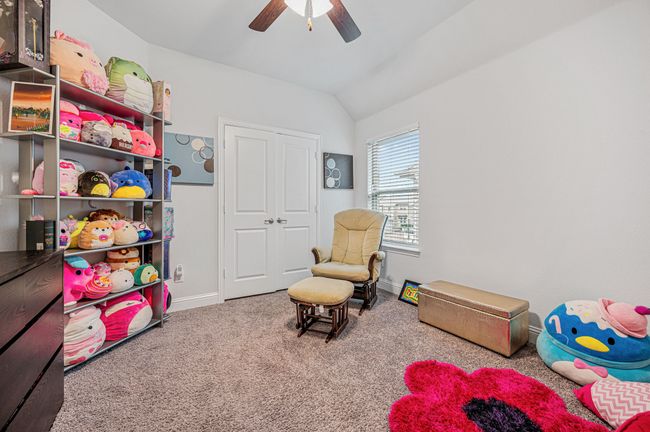 Bedroom with ceiling fan and closet | Image 28