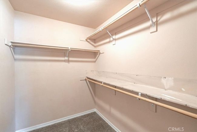 Primary walk-in closet | Image 17