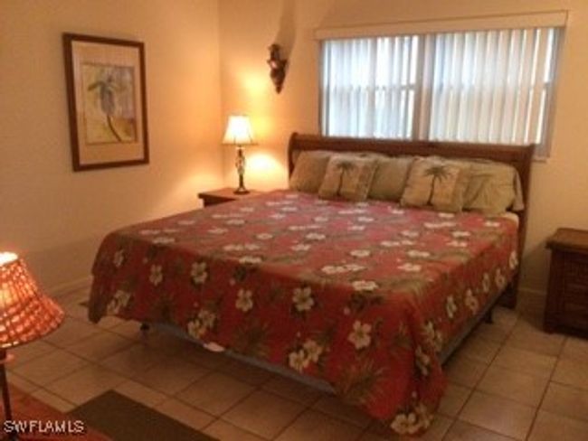 View of tiled bedroom | Image 15