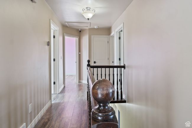 Corridor featuring hardwood / wood-style flooring and baseboards | Image 28