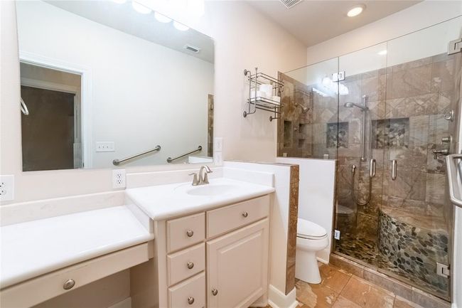 Guest bathroom has a beautiful walk in shower. | Image 32