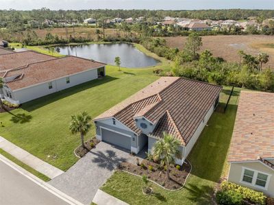 225 Daylily Boulevard, House other with 4 bedrooms, 3 bathrooms and null parking in Nokomis FL | Image 2