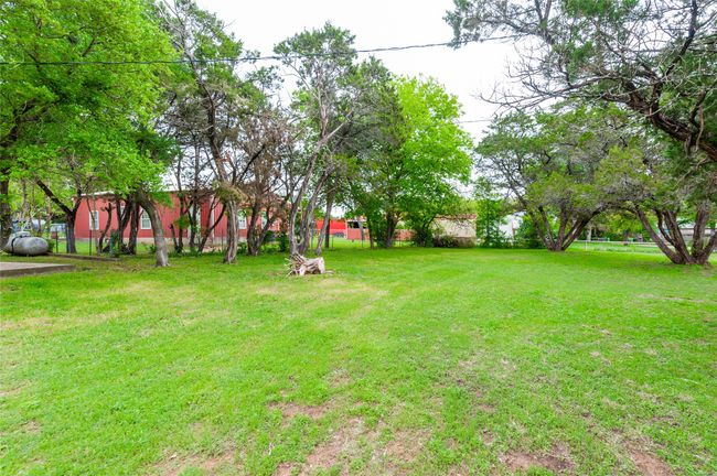 View of yard with fence | Image 8