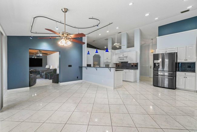 61 W Rubber Tree Dr, House other with 3 bedrooms, 2 bathrooms and null parking in Lake Worth FL | Image 8