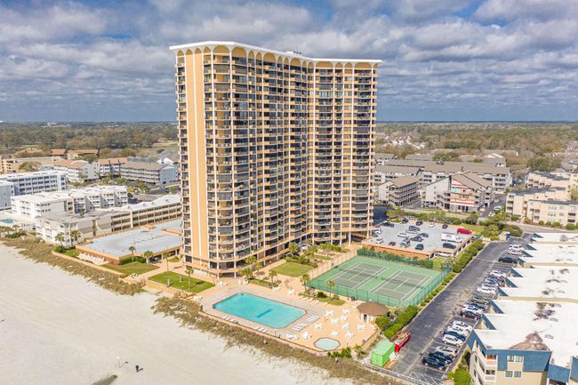 Birds eye view of property with a water view and a beach view | Image 29