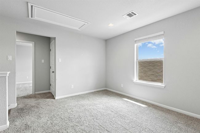 Carpeted spare room with attic access and baseboards | Image 22