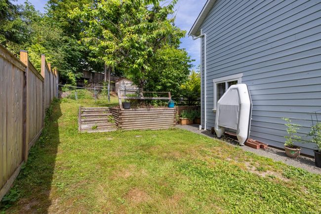VIEWS OF HALF DUPLEX YARD....WEST SIDE OF UNIT | Image 6