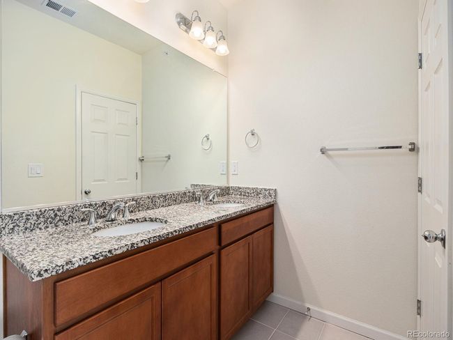 E - 5755 S Buchanan Ct, House attached with 2 bedrooms, 1 bathrooms and null parking in Aurora CO | Image 17