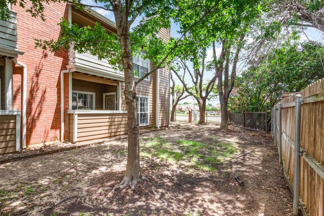 View of yard featuring fence | Image 25