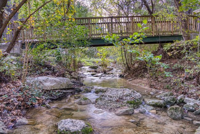 Happy Trails bridge over Indian Creek that leads to the Geronimo Park playground | Image 33