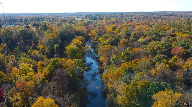 Aerial view featuring a water view | Image 13