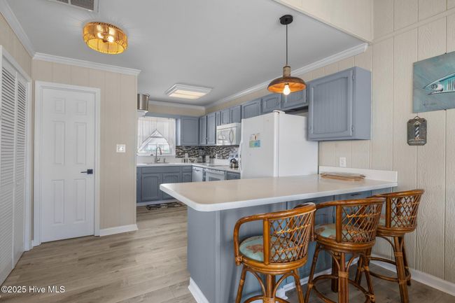 Dining area open to Breakfast bar and kitchen | Image 18