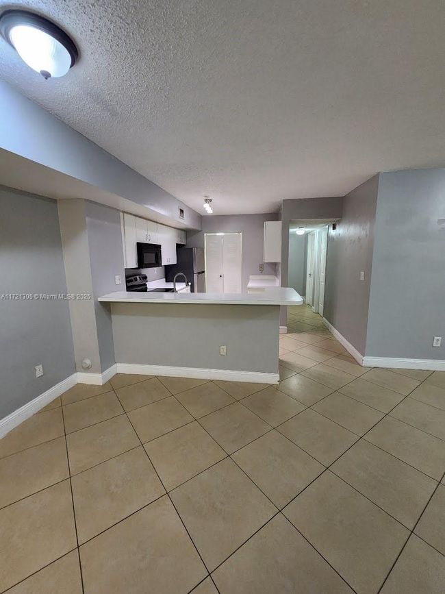 APT-129 - 2600 S University Dr, Condo with 3 bedrooms, 2 bathrooms and null parking in Davie FL | Image 25