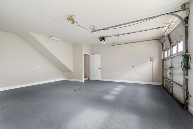 The detached garage is 576 square feet with a single garage door opener. | Image 35