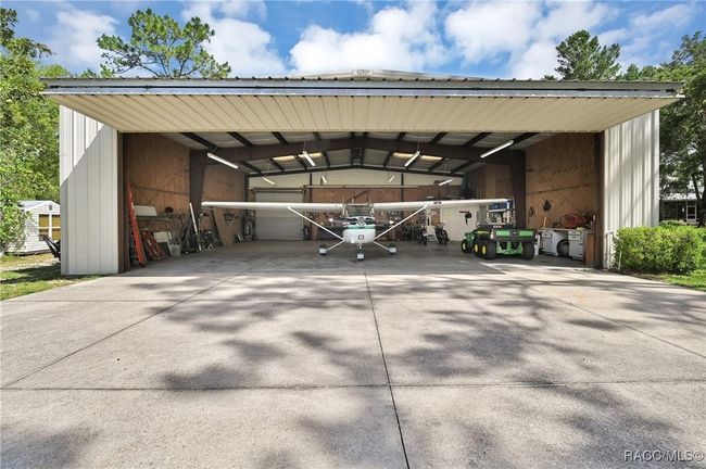 45x50 hangar with 1/2 bath, compressor, rollup door at back and side door entry, let's go flying! | Image 4
