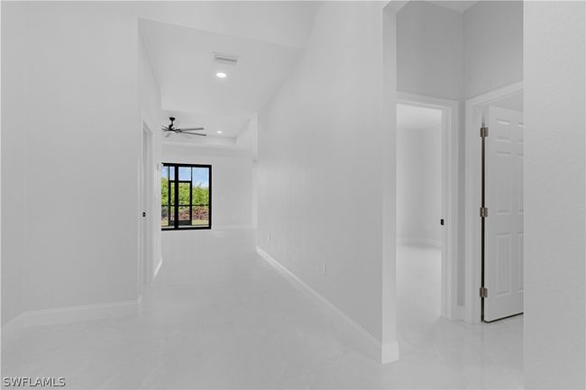 Hallway with tile floors | Image 18