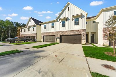 View of front facade with a garage | Image 2