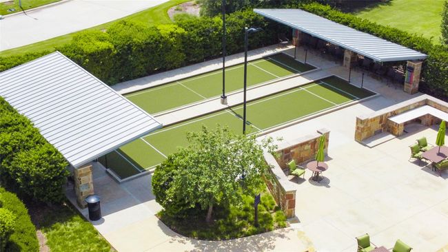 Enjoy friendly competition on the community’s bocce ball courts, complete with shaded seating areas for spectators. | Image 31
