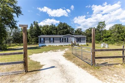 114 Country Living Lane, House other with 3 bedrooms, 2 bathrooms and null parking in Melrose FL | Image 1