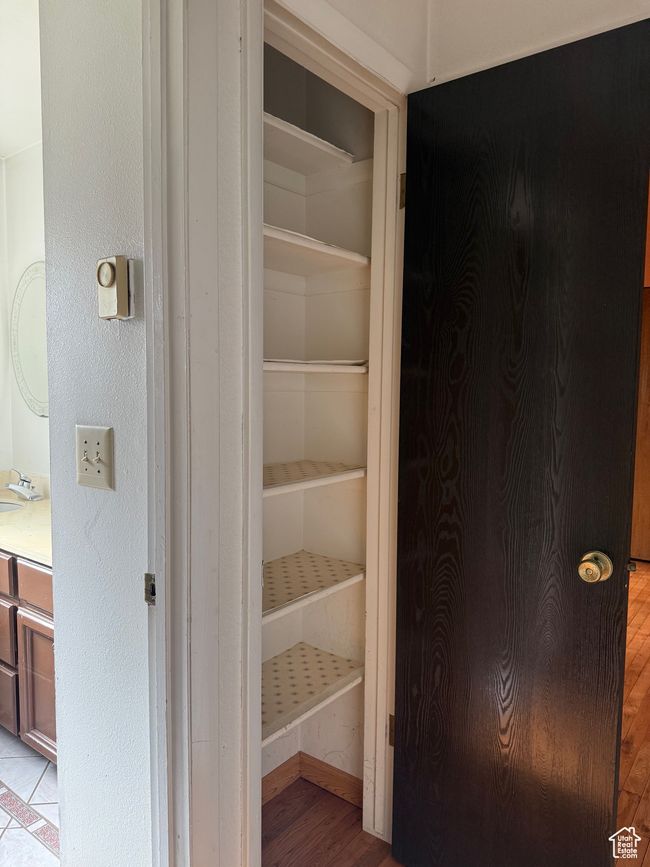 Closet featuring a sink | Image 19